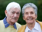 Portrait of a beautiful elder couple smiling outdoors